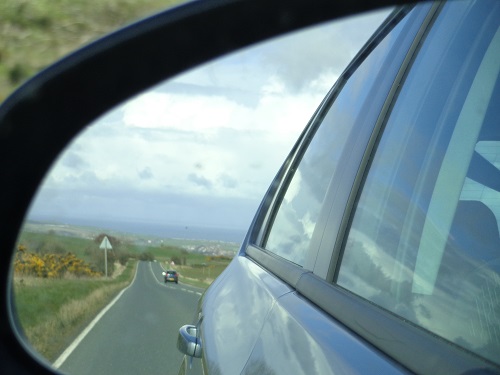 Watching the weather approach from the wing mirrors.