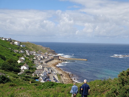 The beautiful surf town of Sennen Cove, just one of the many great spots along the South West Coastal Path