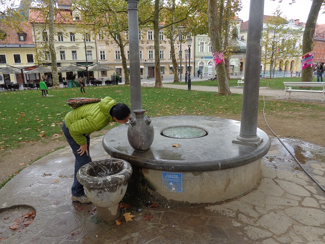 Drinking from one of the funky water fountains in Ljubljana. It's true, there is no need to purchase bottled water! Reduce waste and hydrate everyone. What a fantastic idea.